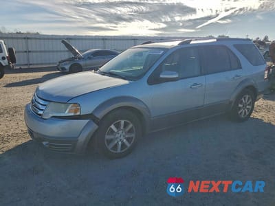 2008 FORD TAURUS X SEL 1FMDK02WX8GA27833 - główne zdjęcie licytacji z USA - miniatura