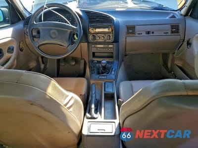 Zdjęcie 8 z 12 samochodu: 1993 BMW 318 I VIN:WBACA5315PFG05926 - miniatura