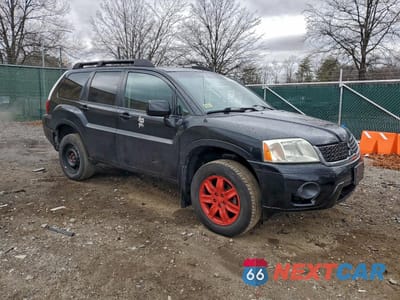 Czwarte zdjęcie samochodu z boku: 2011 MITSUBISHI ENDEAVOR LS VIN:4A4JN2ASXBE026296 - miniatura