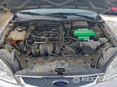 Zdjęcie 11 z 12 samochodu: 2005 FORD FOCUS ZX4 VIN:1FAFP34N05W170673 - miniatura