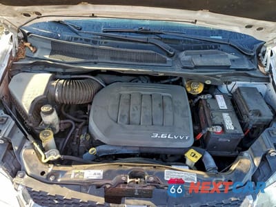 Zdjęcie 12 z 13 samochodu: 2014 DODGE GRAND CARAVAN SE VIN:2C4RDGBG3ER282050 - miniatura