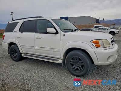 Czwarte zdjęcie samochodu z boku: 2003 TOYOTA SEQUOIA LIMITED VIN:5TDZT38A73S177269 - miniatura