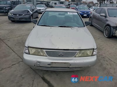 Piąte zdjęcie samochodu w środku: 1995 NISSAN SENTRA BASE VIN:1N4AB41D1SC760369 - miniatura