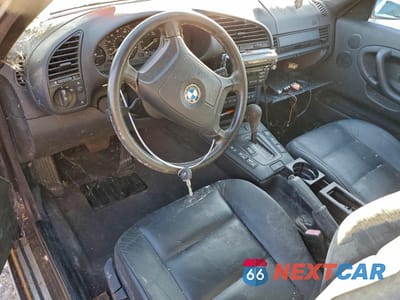 Zdjęcie 8 z 13 samochodu: 1998 BMW 323 IC AUTOMATIC VIN:WBABJ8325WEM21688 - miniatura