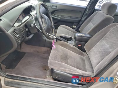 Zdjęcie 7 z 14 samochodu: 1999 NISSAN MAXIMA GLE VIN:JN1CA21D0XT210309 - miniatura