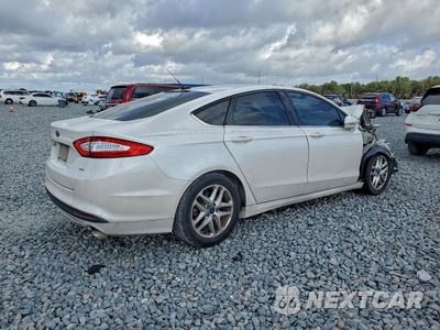Trzecie zdjęcie samochodu z tyłu: 2016 FORD FUSION SE VIN:3FA6P0H77GR211574 - miniatura
