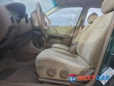 Zdjęcie 7 z 12 samochodu: 2000 MAZDA PROTEGE DX VIN:JM1BJ2225Y0218642 - miniatura