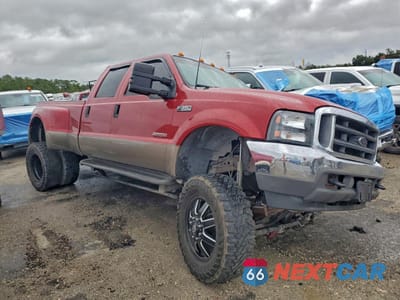 Czwarte zdjęcie samochodu z boku: 2003 FORD F350 SUPER DUTY VIN:1FTWW33P93EC52985 - miniatura