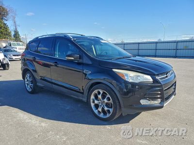 Czwarte zdjęcie samochodu z boku: 2016 FORD ESCAPE TITANIUM VIN:1FMCU0J93GUB66767 - miniatura