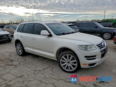 Czwarte zdjęcie samochodu z boku: 2010 VOLKSWAGEN TOUAREG TDI VIN:WVGFK7A93AD002177 - miniatura