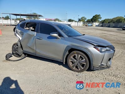 Czwarte zdjęcie samochodu z boku: 2022 LEXUS UX 250H BASE VIN:JTHX9JBH9N2059961 - miniatura