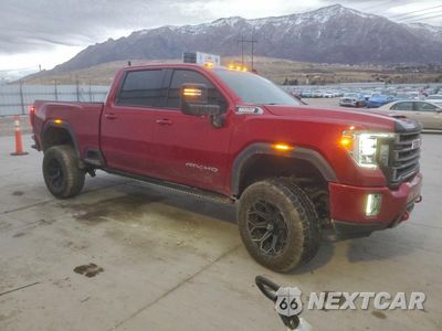 Czwarte zdjęcie samochodu z boku: 2021 GMC SIERRA K3500 AT4 VIN:1GT49VEY1MF186931 - miniatura