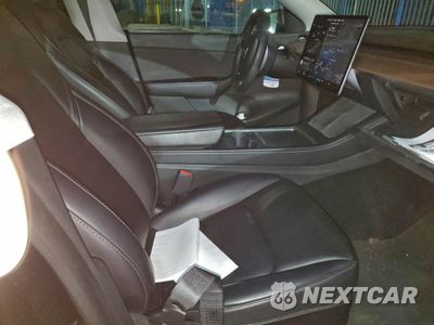 Zdjęcie 13 z 14 samochodu: 2022 TESLA MODEL Y VIN:7SAYGDEE1NF341879 - miniatura