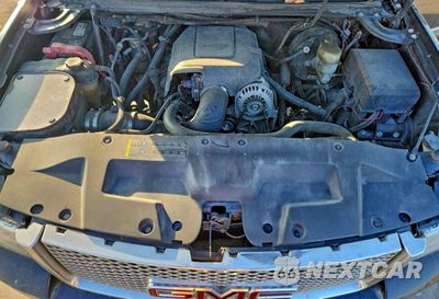 Zdjęcie 11 z 14 samochodu: 2007 GMC NEW SIERRA DENALI VIN:2GTEK638071707585 - miniatura