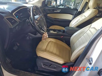 Zdjęcie 7 z 13 samochodu: 2019 FORD EDGE SEL VIN:2FMPK3J90KBB99717 - miniatura