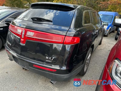 Czwarte zdjęcie samochodu z boku: 2016 LINCOLN MKT VIN:2LMHJ5AT1GBL01391 - miniatura