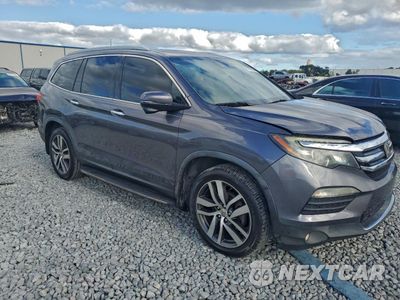 Czwarte zdjęcie samochodu z boku: 2017 HONDA PILOT TOURING VIN:5FNYF5H97HB015884 - miniatura