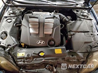 Zdjęcie 11 z 12 samochodu: 2003 HYUNDAI TIBURON GT VIN:KMHHN65F13U029035 - miniatura