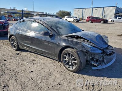 Czwarte zdjęcie samochodu z boku: 2021 TESLA MODEL 3 VIN:5YJ3E1EA8MF986097 - miniatura