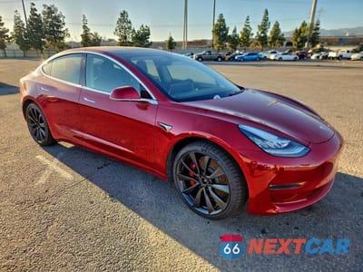 Czwarte zdjęcie samochodu z boku: 2020 TESLA MODEL 3 VIN:5YJ3E1EC0LF641100 - miniatura