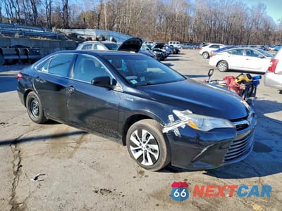 Czwarte zdjęcie samochodu z boku: 2016 TOYOTA CAMRY HYBRID LE VIN:4T1BD1FK3GU181511 - miniatura