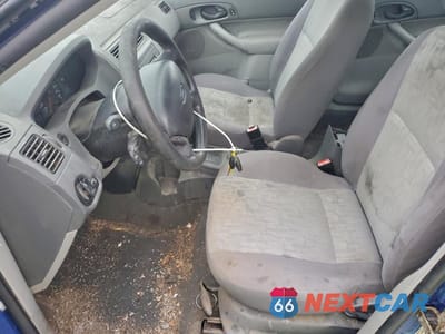 Zdjęcie 7 z 12 samochodu: 2005 FORD FOCUS ZX4 VIN:1FAFP34N25W120776 - miniatura