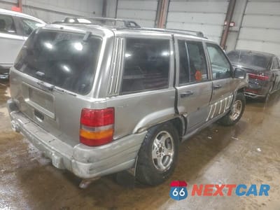 Trzecie zdjęcie samochodu z tyłu: 1998 JEEP GRAND CHEROKEE LAREDO VIN:1J4GZ58S1WC237685 - miniatura
