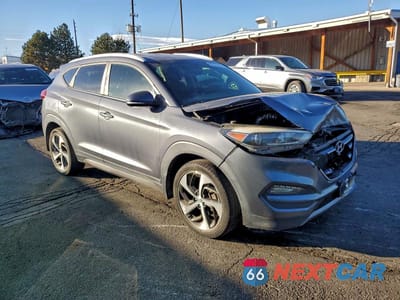 Czwarte zdjęcie samochodu z boku: 2016 HYUNDAI TUCSON VIN:KM8J3CA20GU157863 - miniatura