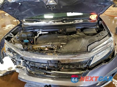 Zdjęcie 12 z 13 samochodu: 2019 HONDA PILOT ELITE VIN:5FNYF6H06KB031279 - miniatura