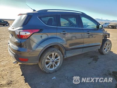 Trzecie zdjęcie samochodu z tyłu: 2018 FORD ESCAPE SE VIN:1FMCU0GD5JUD22018 - miniatura