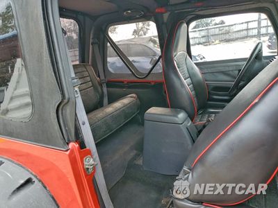 Zdjęcie 11 z 13 samochodu: 2000 JEEP WRANGLER / TJ SE VIN:1J4FA29P0YP738963 - miniatura