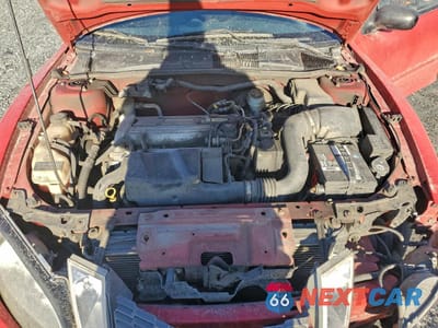 Zdjęcie 11 z 13 samochodu: 2004 PONTIAC SUNFIRE VIN:3G2JB12F94S100333 - miniatura