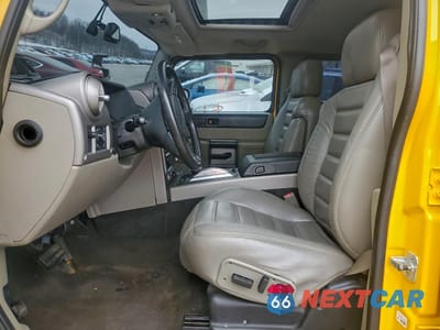 Zdjęcie 7 z 15 samochodu: 2003 HUMMER H2 VIN:5GRGN23U23H136418 - miniatura