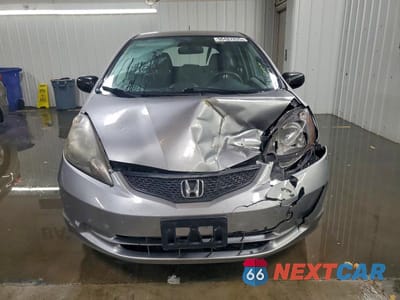 Piąte zdjęcie samochodu w środku: 2010 HONDA FIT VIN:JHMGE8H21AS023439 - miniatura