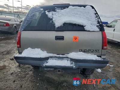 Zdjęcie 6 z 12 samochodu: 1999 CHEVROLET TAHOE K1500 VIN:1GNEK13R4XJ460340 - miniatura