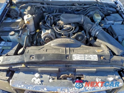 Zdjęcie 12 z 15 samochodu: 1999 GMC JIMMY VIN:1GKDT13WXX2558102 - miniatura