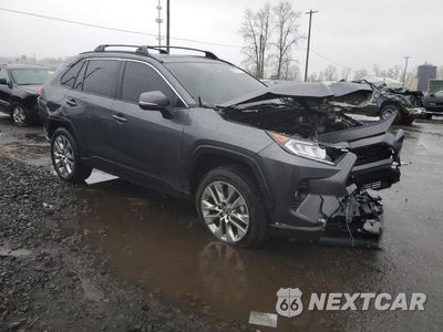 Czwarte zdjęcie samochodu z boku: 2019 TOYOTA RAV4 XLE PREMIUM VIN:JTMA1RFV8KD524016 - miniatura