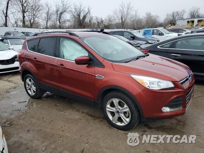 Czwarte zdjęcie samochodu z boku: 2016 FORD ESCAPE SE VIN:1FMCU0GX6GUC40821 - miniatura