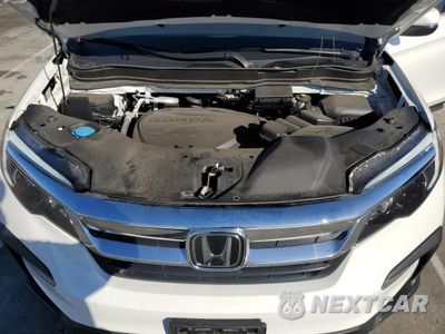 Zdjęcie 12 z 13 samochodu: 2022 HONDA PILOT EXL VIN:5FNYF5H56NB038310 - miniatura