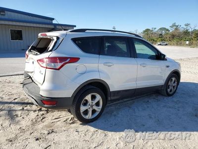 Trzecie zdjęcie samochodu z tyłu: 2016 FORD ESCAPE SE VIN:1FMCU0GX5GUC35285 - miniatura