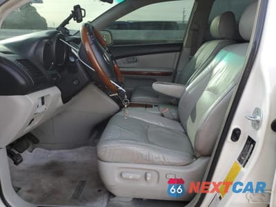 Zdjęcie 7 z 13 samochodu: 2008 LEXUS RX 400H VIN:JTJGW31U082850093 - miniatura