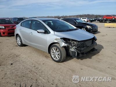 Czwarte zdjęcie samochodu z boku: 2014 KIA FORTE LX VIN:KNAFX4A67E5219254 - miniatura