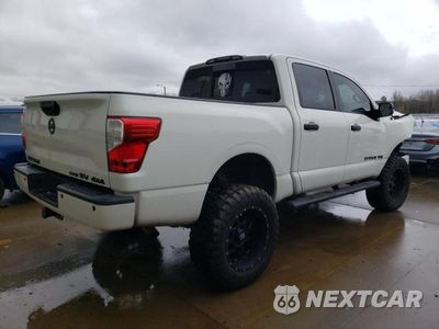Trzecie zdjęcie samochodu z tyłu: 2018 NISSAN TITAN SV VIN:1N6AA1E59JN549452 - miniatura