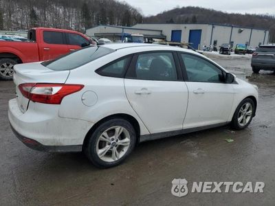 Trzecie zdjęcie samochodu z tyłu: 2013 FORD FOCUS SE VIN:1FADP3F22DL297564 - miniatura