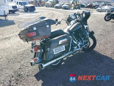 Czwarte zdjęcie samochodu z boku: 2013 HARLEY-DAVIDSON FLHTK ELECTRA GLIDE ULTRA LIMITED VIN:1HD1KEM24DB641989 - miniatura