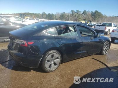 Trzecie zdjęcie samochodu z tyłu: 2023 TESLA MODEL 3 VIN:5YJ3E1EA6PF542298 - miniatura