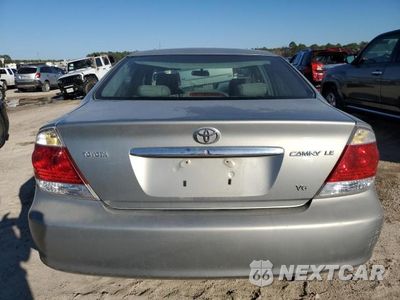 Zdjęcie 6 z 12 samochodu: 2005 TOYOTA CAMRY LE VIN:4T1BF32K55U599206 - miniatura