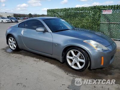 Czwarte zdjęcie samochodu z boku: 2004 NISSAN 350Z COUPE VIN:JN1AZ34D74M100753 - miniatura