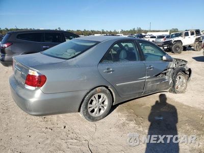 Trzecie zdjęcie samochodu z tyłu: 2005 TOYOTA CAMRY LE VIN:4T1BF32K55U599206 - miniatura