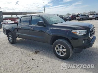 Czwarte zdjęcie samochodu z boku: 2016 TOYOTA TACOMA DOUBLE CAB VIN:5TFBZ5DN1GX001161 - miniatura